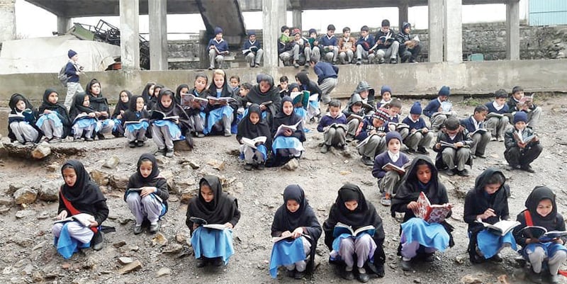 Students of quake-hit primary school in Kehal area of Abbottabad study in the open. — Dawn Students of quake-hit primary school in Kehal area of Abbottabad study in the open. — Dawn