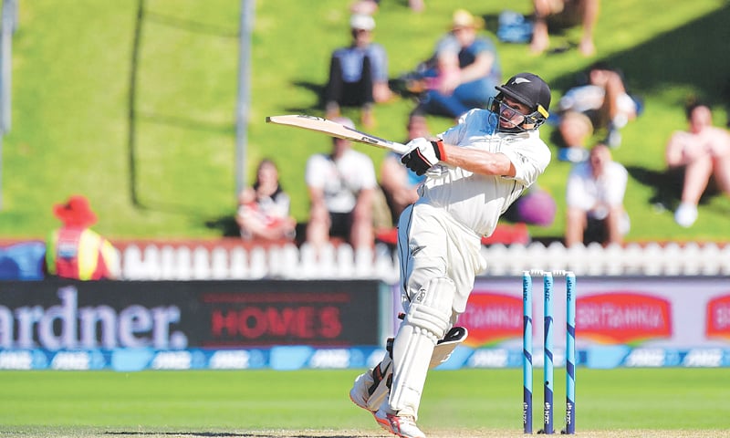 WELLINGTON: New Zealand opener Tom Latham plays a pull shot during his marathon knock in the first Test against Sri Lanka on Monday.—AFP