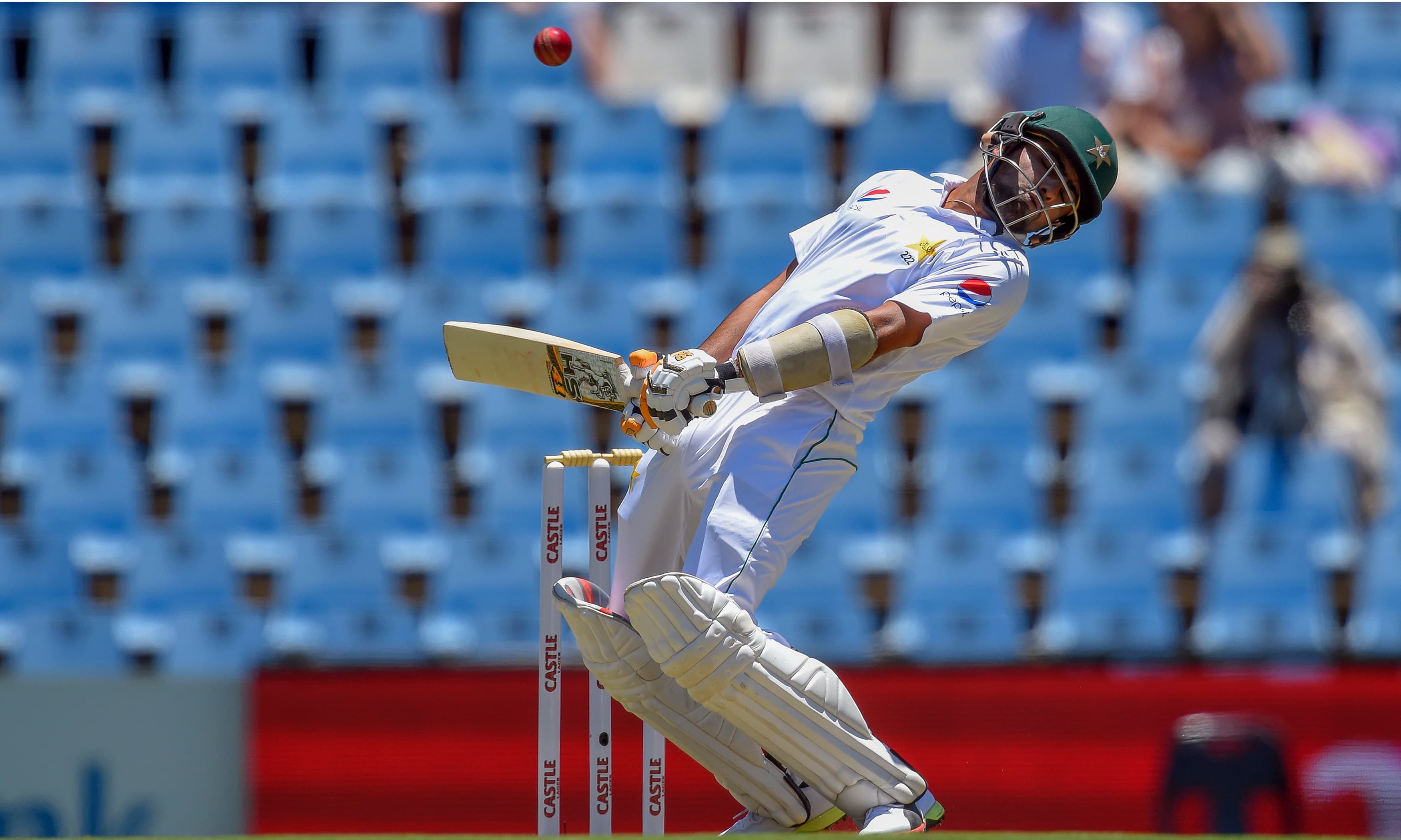 Azhar Ali ducks as he faces South African paceman. —AFP