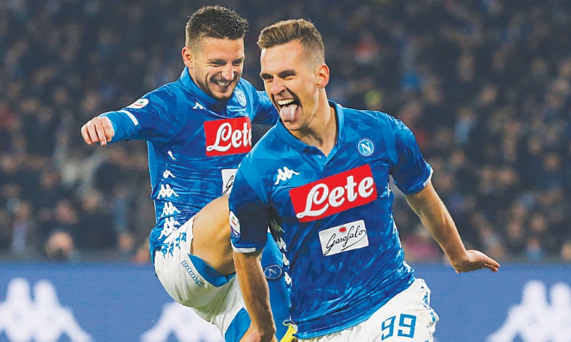 NAPLES: Napoli&rsquo;s Arkadiusz Milik (R) celebrates with team-mate Dries Mertens after scoring during the Serie A match against Bologna at the Stadio San Paolo.
&mdash;Reuters