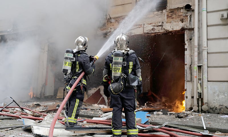 Firefighters extinguish a fire after the explosion of a bakery on the corner of the streets Saint-Cecile and Rue de Trevise in central Paris on January 12, 2019. Firefighters extinguish a fire after the explosion of a bakery on the corner of the streets Saint-Cecile and Rue de Trevise in central Paris on January 12, 2019.