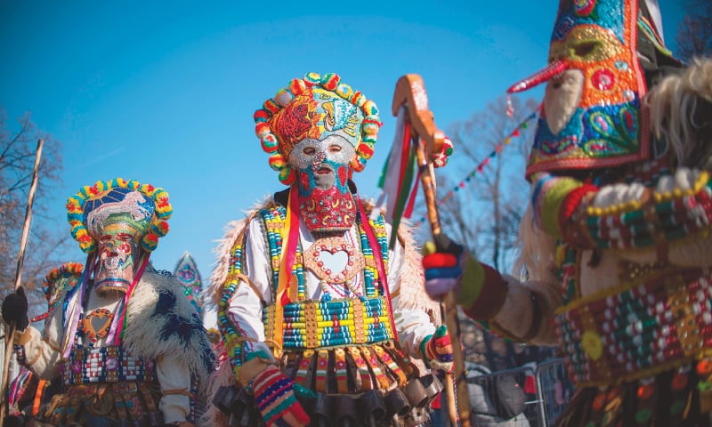 PERNIK (Bulgaria): Dancers, known as Kukeri, perform during the International Festival of the Masquerade Games 
on Sunday.&mdash;AFP