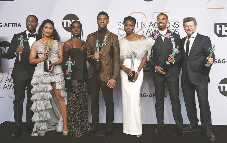 LOS ANGELES: The cast of Black Panther pose with their awards at the annual Screen Actors Guild Awards on Monday.—AP