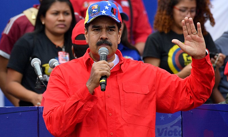 Venezuelan President Nicolas Maduro delivers a speech during a gathering with supporters to mark the 20th anniversary of the rise of power of the late Hugo Chavez, on Feb 2, 2019. — AFP