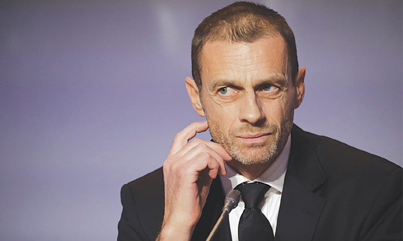 UEFA president Aleksander Ceferin listens to a question during the press conference.&mdash;AP