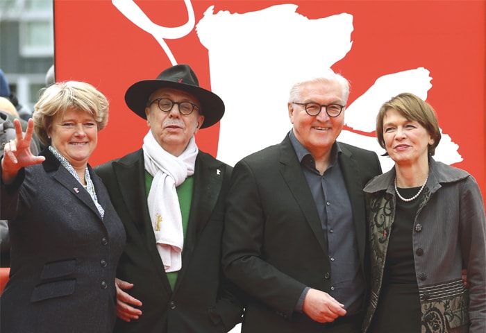 From left, Monika Gruetters, Federal Government Commissioner for Culture and the Media, festival director Dieter Kosslick, German President Frank-Walter Steinmeier and his wife Elke Buedenbender pose for the media on the red carpet for the film ‘Brecht’ at the 2019 Berlinale Film Festival on Saturday.—AP