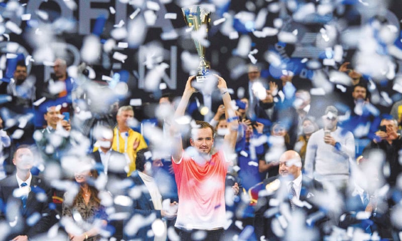 SOFIA: Russia’s Daniil Medvedev celebrates with the trophy after winning the Sofia Open final against Marton Fucsovics of Hungary.—AFP