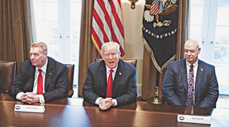 Washington: In this March 1, 2018 photo, President Donald Trump speaks during a meeting with steel and aluminum executives in the Cabinet Room of the White House, with Nucor’s John Ferriola, left, and Dave Burritt of US Steel Corporation.—AP