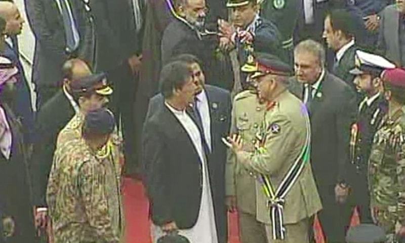 Prime Minister Imran Khan and COAS Gen Qamar Javed Bajwa confer after the crown prince departs. ─ DawnNewsTV