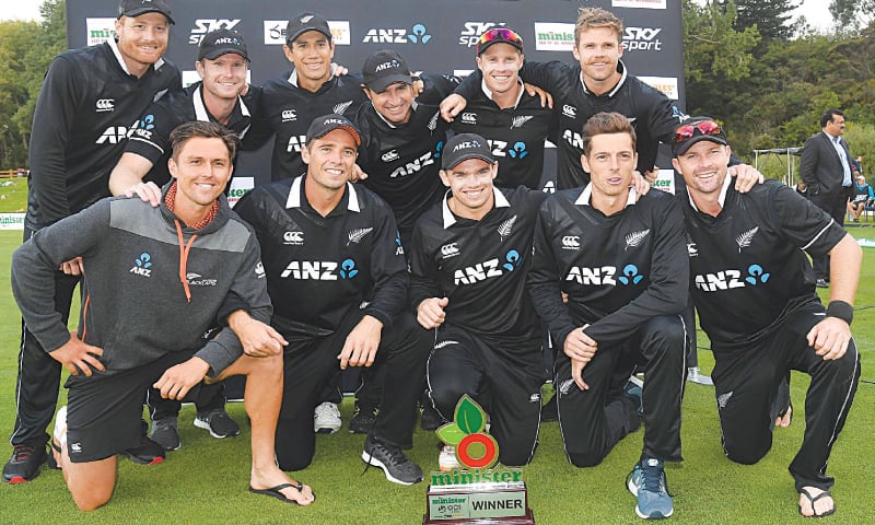 DUNEDIN: New Zealand cricketers pose with the trophy as they celebrate their series triumph following the third One-day International against Bangladesh at the University Oval on Wednesday.&mdash;AFP