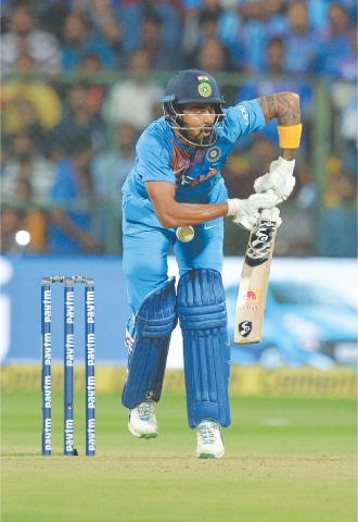 BANGALORE: Indian opener batsman K.L. Rahul reacts after being hit by a ball during the second Twenty20 International against Australia at the M. Chinnaswamy Stadium on Wednesday.—AFP