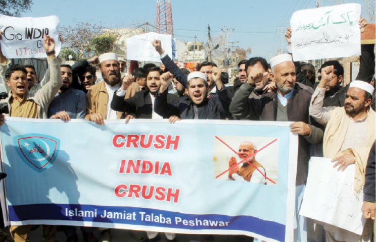 Activists of Islami Jamiat Talaba stage an anti-India protest in Peshawar on Wednesday. — INP Activists of Islami Jamiat Talaba stage an anti-India protest in Peshawar on Wednesday. — INP