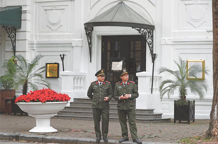 HANOI: Vietnamese police outside the French colonial-era Sofitel Legend Metropole Hotel.—Reuters