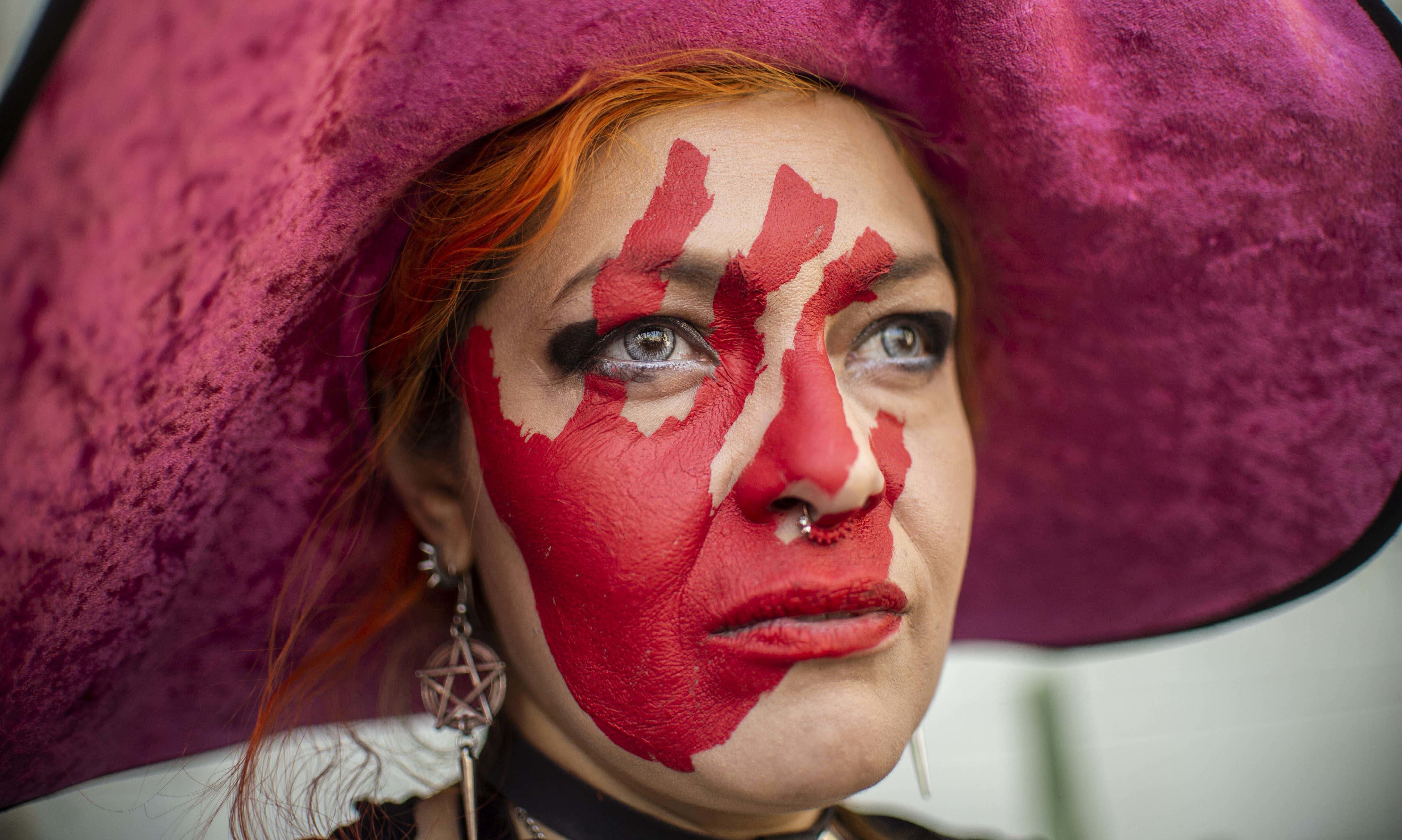 On February 02, 2019 a woman with her face painted took part in a protest against gender violence and femicides in Mexico City.  — AFP