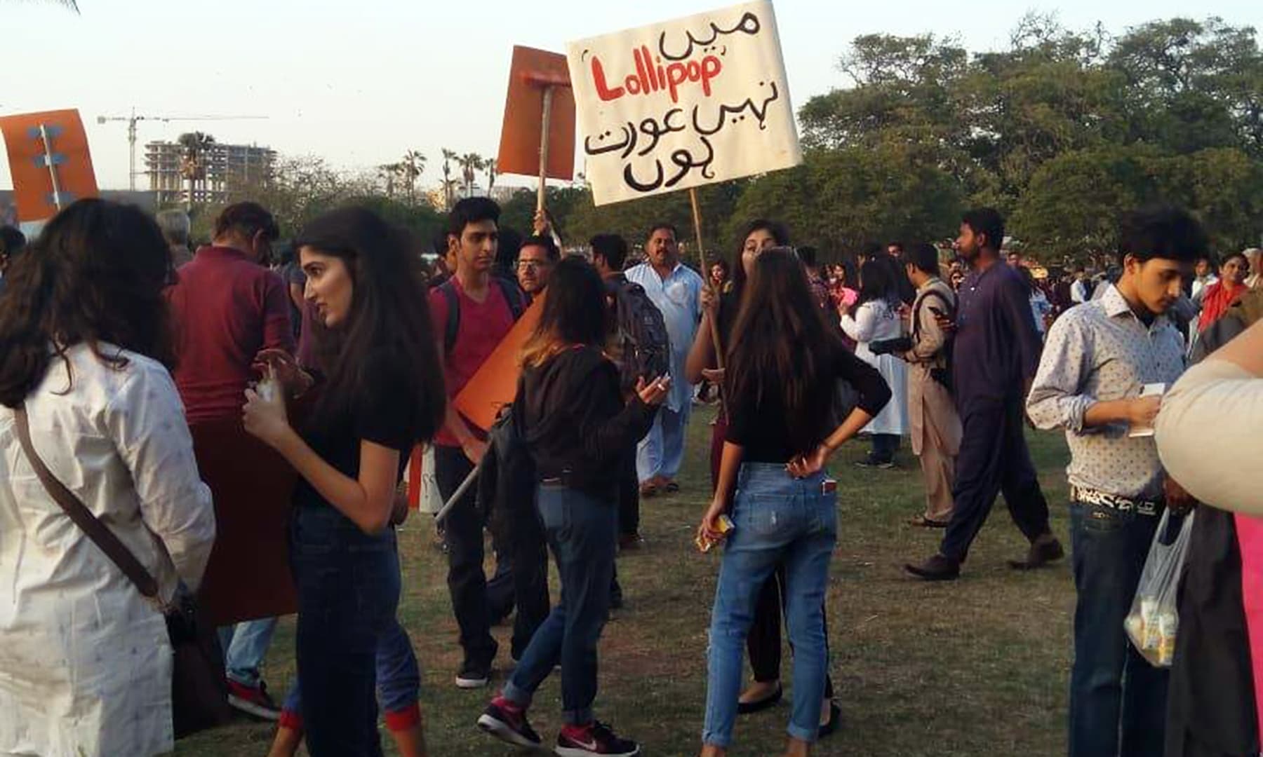 People attend an event in connection with the 'Aurat March' on International Women's Day in Karachi on Friday. — Photo: Sukena Rizvi