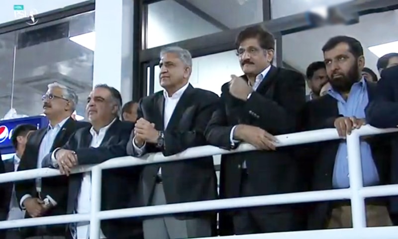 Army chief Gen Qamar Bajwa pictured watching the show with Sindh Chief Minister Murad Ali Shah and Governor Imran Ismail. — DawnNewsTV