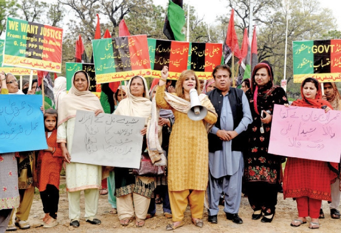 PPP women wing general secretary Nargis Faiz Malik leads a protest outside the National Press Club on Monday. — White Star