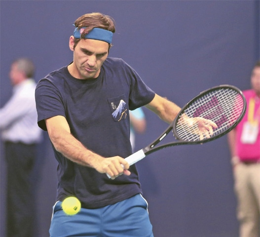 MIAMI GARDENS: Roger Federer of Switzerland practises for the Miami Masters.—AP