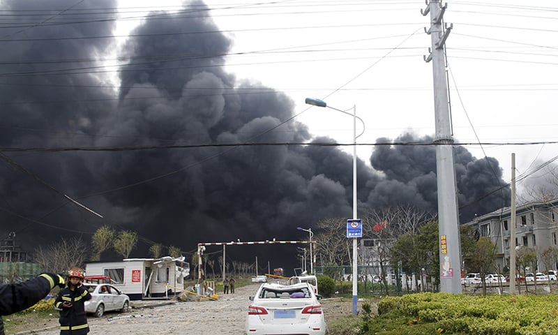 In this photo released by Xinhua News Agency, firefighters walk past the site of a factory explosion in a chemical industrial park in Xiangshui County of Yancheng in eastern China's Jiangsu province on Thursday, March 21, 2019. — AP