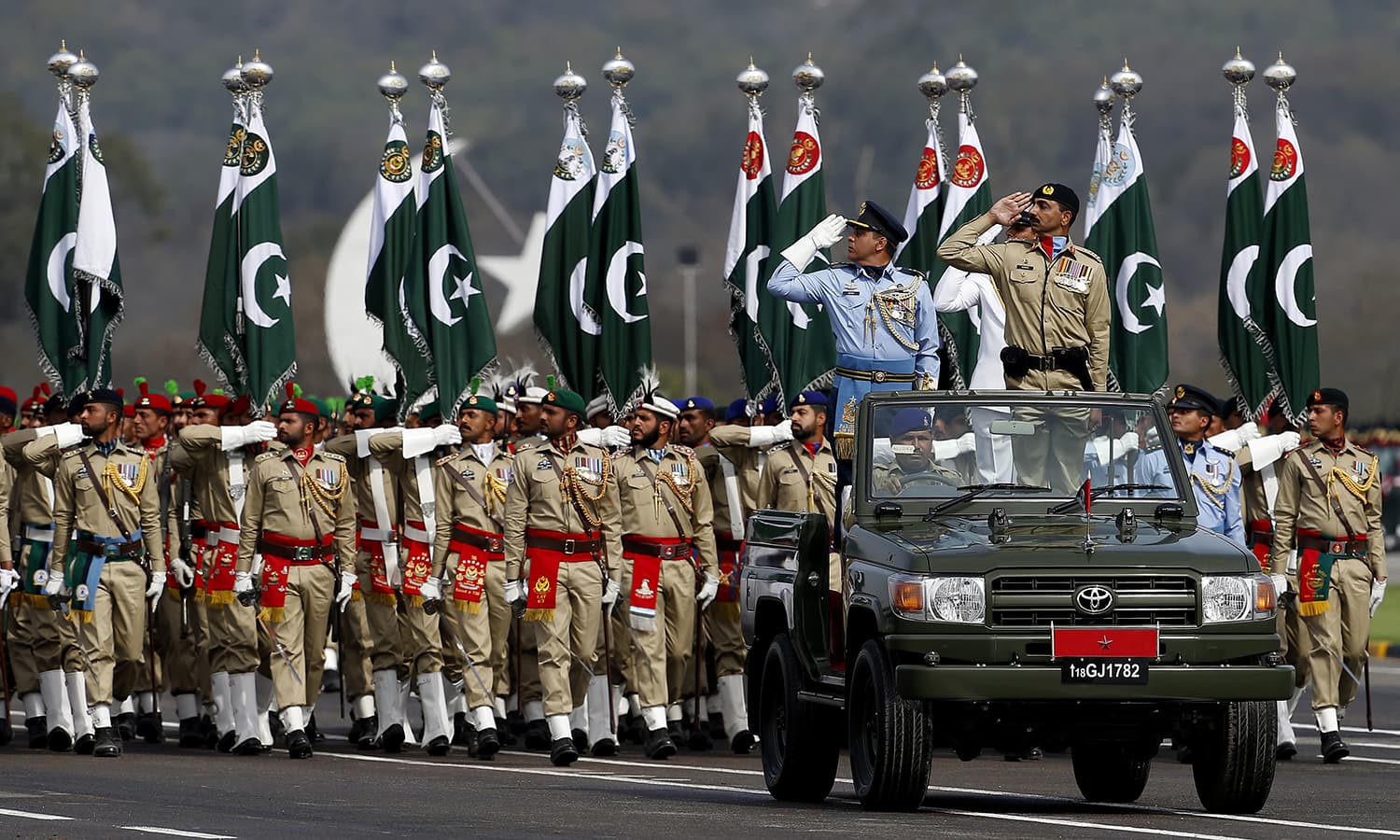 Troops march during the military parade. ─ AP