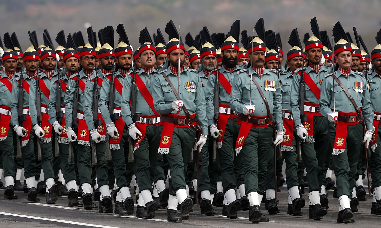 Paramilitary troops march during the military parade. ─ AP