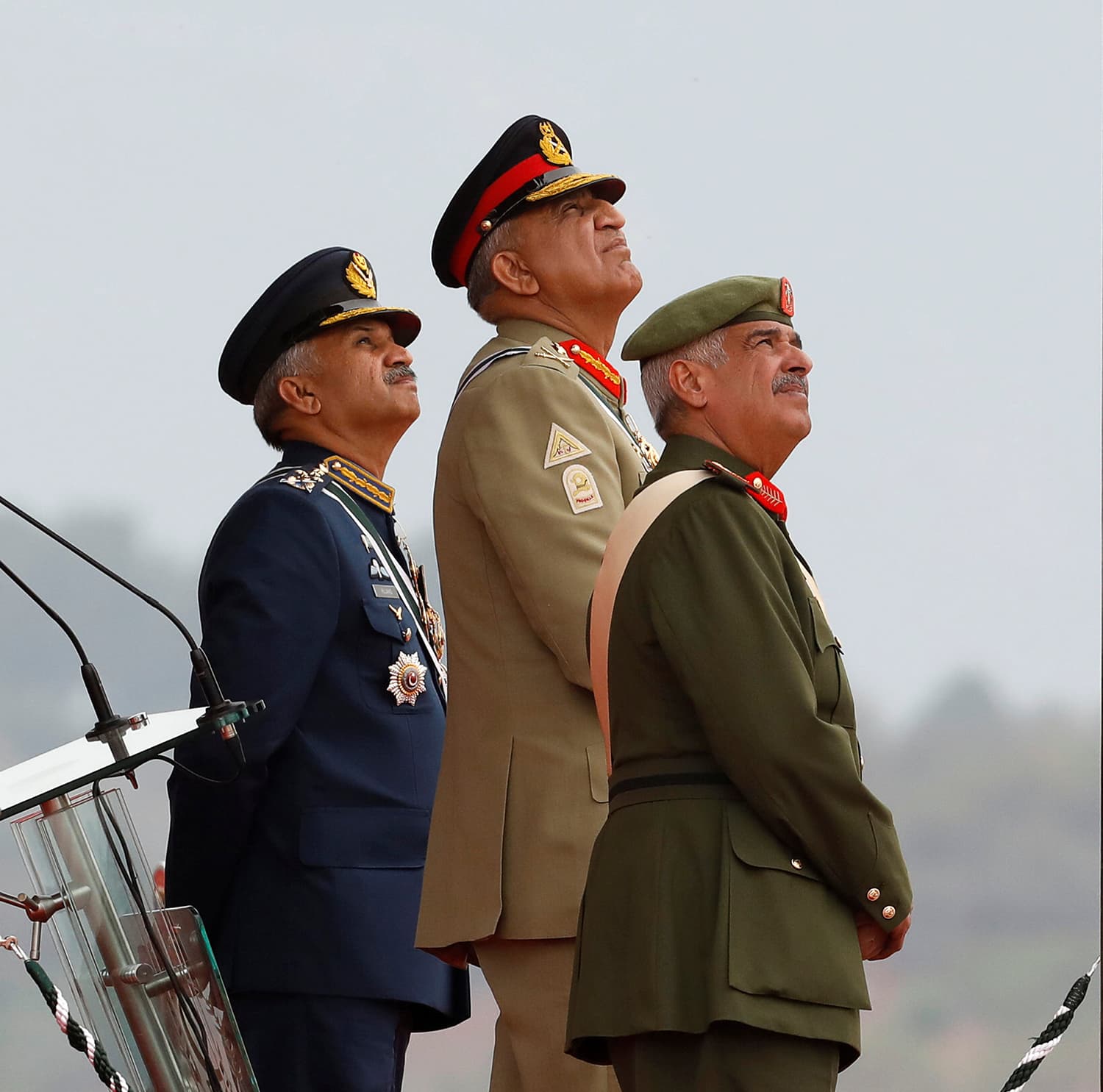 Chief of Army Staff Gen Qamar Javed Bajwa (C) along with Commander of the National Guard of the Kingdom of Bahrain Lieutenant-General Sheikh Mohammed bin Isa bin Salman Al Khalifa and Air Chief Marshal Mujahid Anwar Khan observe the fly-past by Pakistan Air Force JF-17 Thunder fighter jets during the Pakistan Day military parade in Islamabad. ─ Reuters