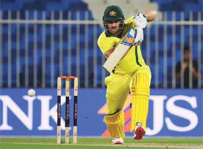 AUSTRALIAN captain Aaron Finch drives the ball during his scintillating knock on Sunday.—AFP