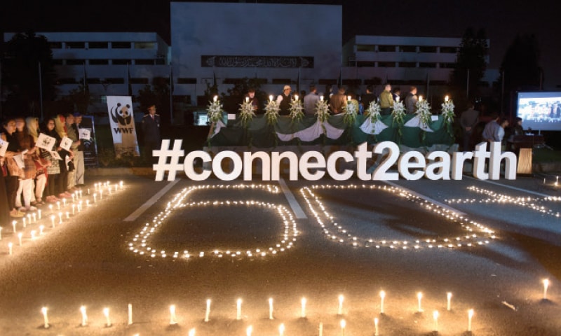 Candles have been lit on the premises of the Parliament House as Earth Hour was celebrated in Islamabad on Saturday. &mdash; Photo by Tanveer Shahzad