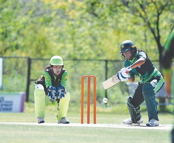 ISLAMABAD: SBP&rsquo;s Ayesha Zafar attempts to play a shot against PCB XI during the Women&rsquo;s T20 Inter-department Cricket Championship match at the Diamond Club Ground on Sunday.&mdash;Courtesy PCB