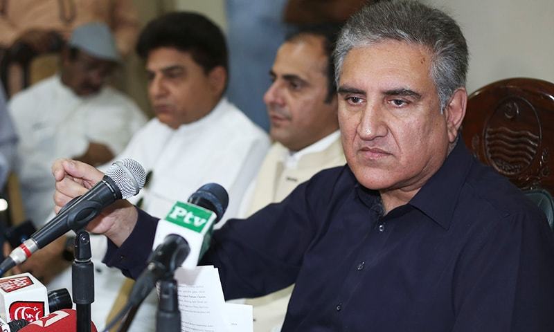 Foreign Minister Shah Mahmood Qureshi addresses a press conference in Multan on Sunday. ─ AFP