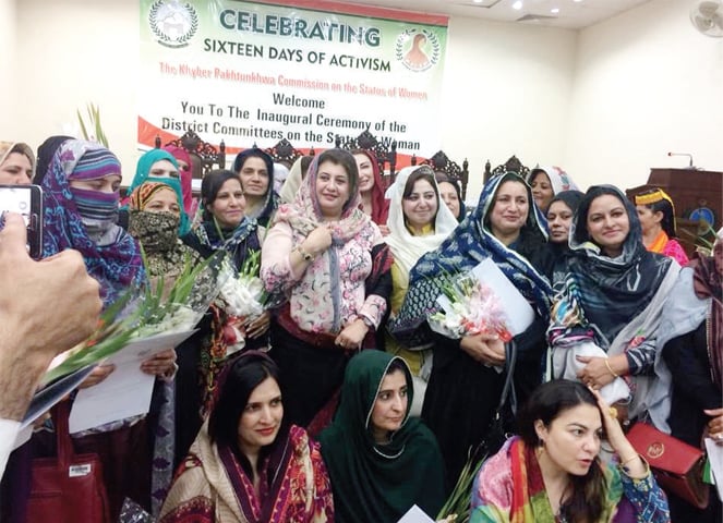 A group photo of women nominated for district committees at the inaugural ceremony in Peshawar. — File photo