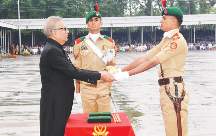 President Dr Arif Alvi awarding coveted sword of honour to senior under officer Haider Ali Khan at the Pakistan Military Academy, Kakul, on Saturday.—INP