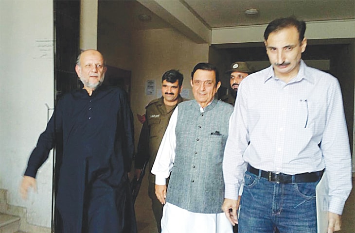 ISLAMABAD: Former petroleum secretary Shahid Rafi leaving the NAB court after a hearing in the Karkey rental power plant case on Saturday.—Online