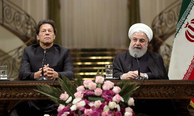 In this file photo, Prime Minister Imran Khan and Iranian President Hassan Rouhani address a joint press conference after talks on Monday. &mdash; Photo by Iranian Presidency / AFP