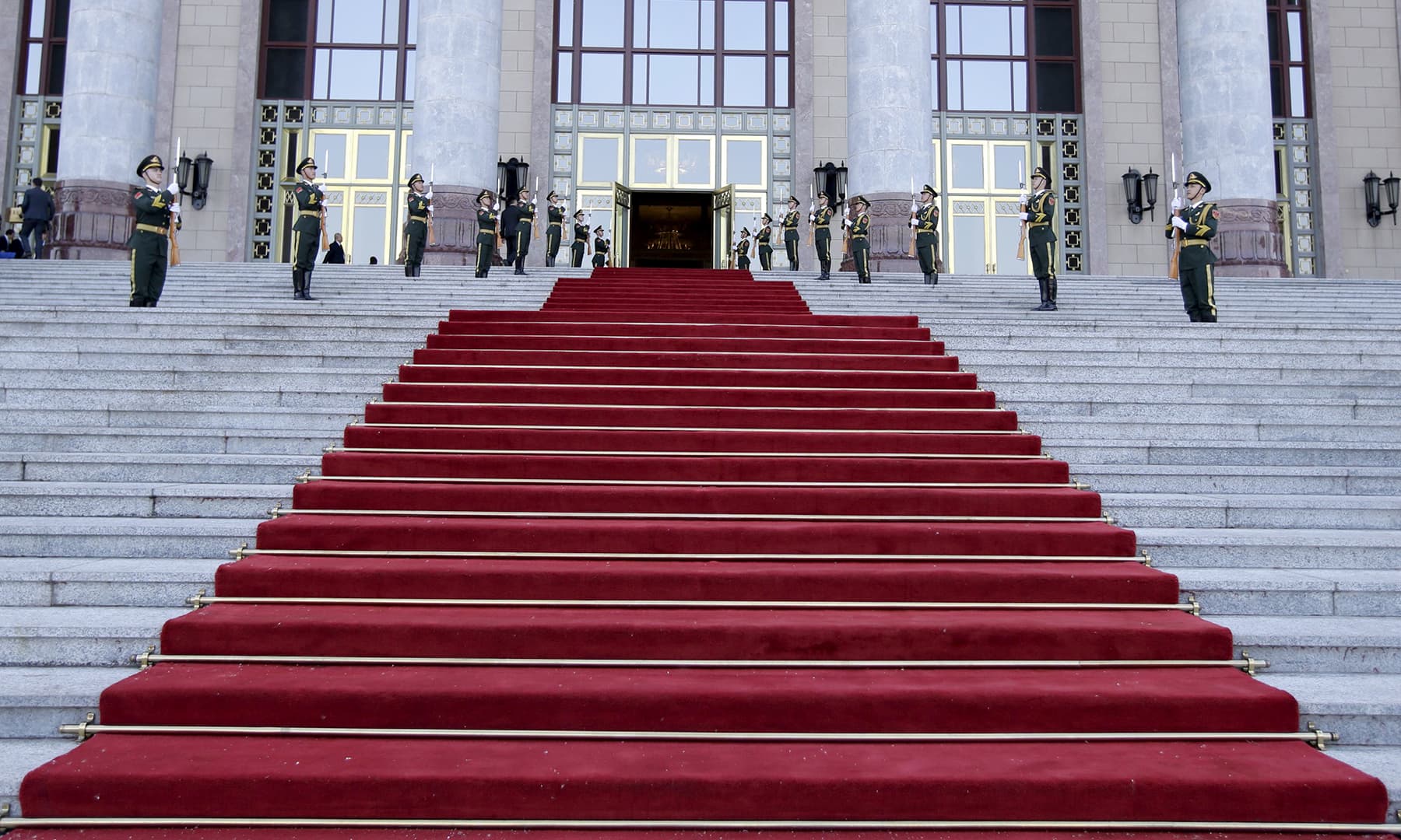 Members of the Chinese Honour Guard prepare for a welcome banquet for leaders attending the Belt and Road Forum outside the Great Hall of the People, in Beijing. — AFP