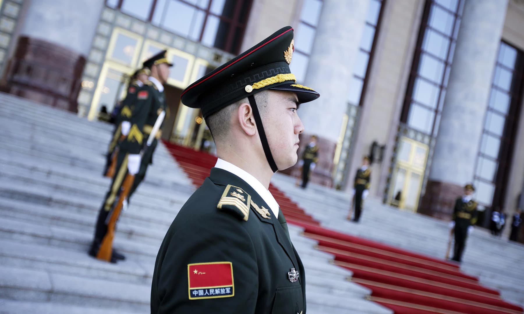 A member of the Chinese Honour Guard pictured outside the Great Hall of the People, in Beijing, before the start of the welcome banquet. — AFP