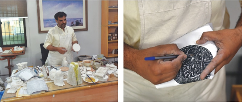 A craftsman shows museum visitors the process of making coin replicas