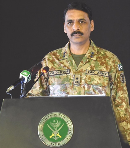 Inter-Services Public Relations Director General Maj Gen Asif Ghafoor addressing a press conference at the General Headquarters on Monday.—INP