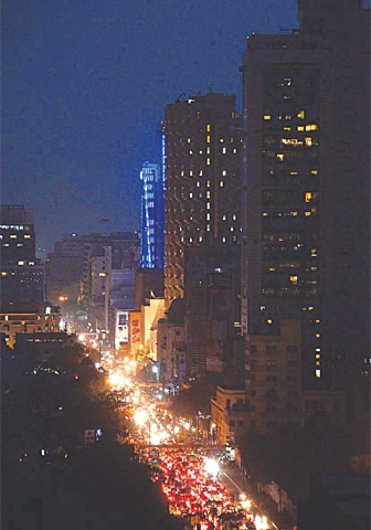 EFFECTS of the blockade lasted into the evening, as this snarl-up on I.I. Chundrigar Road shows.—APP