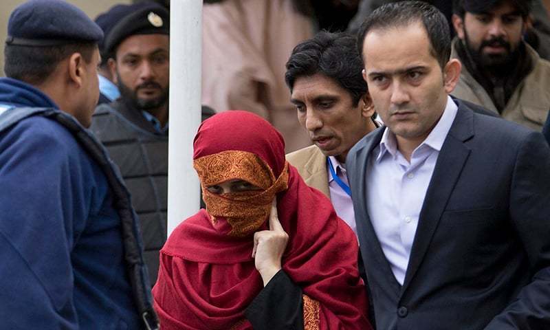 In this Jan 6, 2017, file photo, Maheen Zafar, the wife of sessions judge Raja Khurram Ali is escorted from the Supreme Court by her brother in Islamabad. ─ AP/File