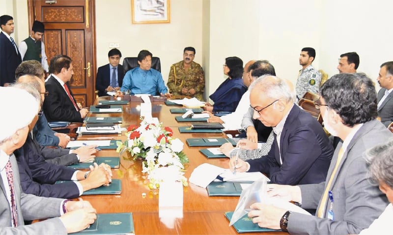 Prime Minister Imran Khan receives briefing on development and public welfare initiatives at PM Office on Thursday.—Online