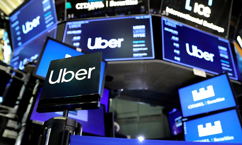 Uber Technologies Inc. logos are seen on screens on the trading floor of the New York Stock Exchange (NYSE) during the company's IPO in New York, US on May 10, 2019. — Reuters