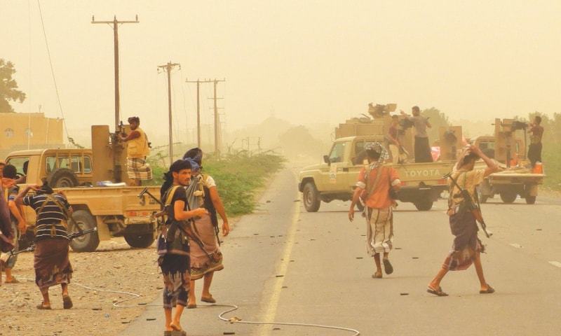 The file picture shows Yemeni pro-government forces gathered near Hodeida airport.—AFP/File