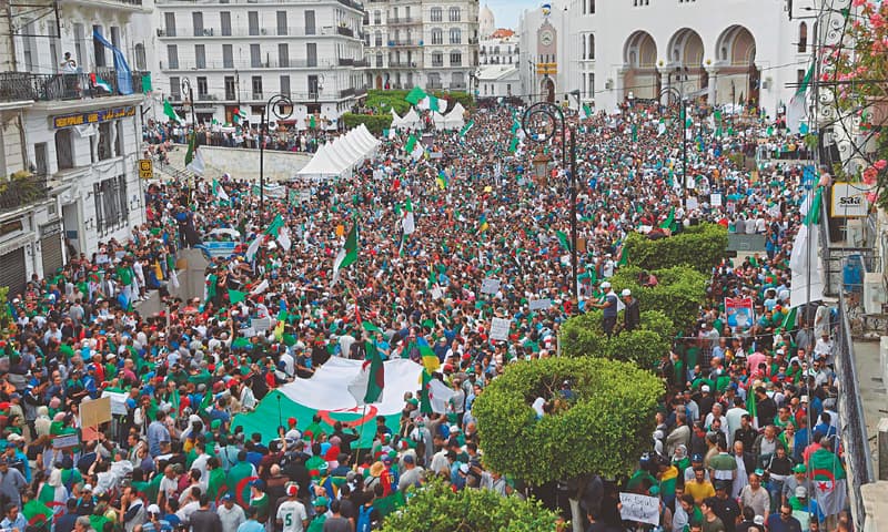 Algiers: Protesters gather outside the main post office for a demonstration against the Algerian government on Friday.—AFP