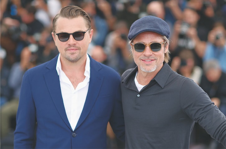 US actors Leonardo DiCaprio (left) and Brad Pitt pose during a photocall for the film “Once Upon a Time... in Hollywood” at the Cannes Film Festival on Wednesday.—AFP