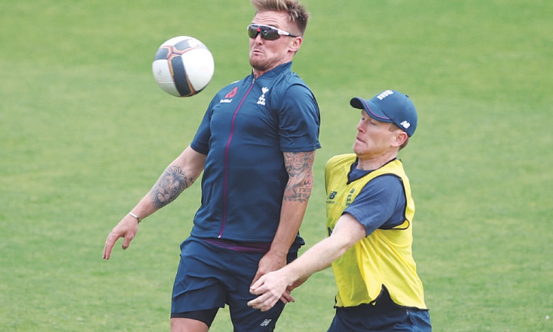 SOUTHAMPTON: England’s Jason Roy (L) and Eoin Morgan play football during a training session at Hampshire Bowl on Friday, on the eve of their World Cup warm-up against Australia.—Reuters