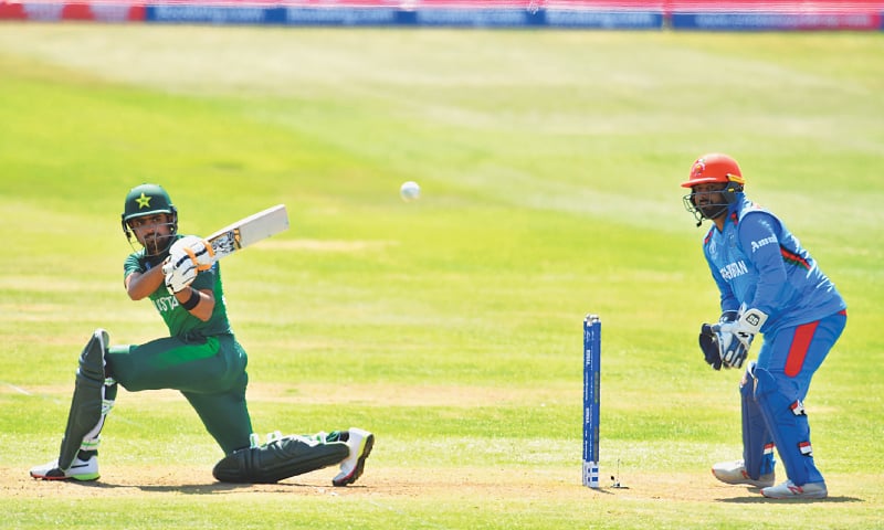 BRISTOL: Pakistan batsman Babar Azam pulls during his century in the World Cup warm-up against Afghanistan at Bristol County Ground on Friday.—AFP