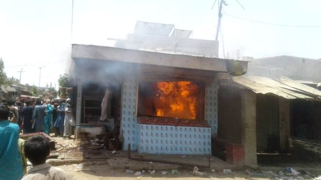 As news of the alleged blasphemy spread, some residents of the area took to the streets and damaged the doctor's clinic. — Photo courtesy BBC Urdu