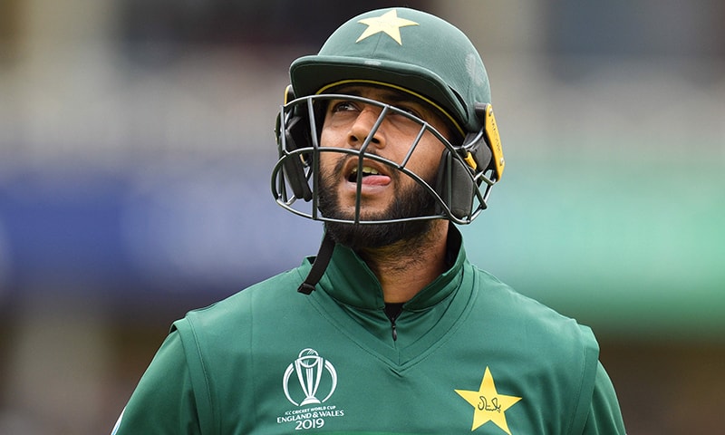 Pakistan's Imad Wasim walks back to the pavilion after getting out for 1 run during the 2019 Cricket World Cup group stage match between West Indies and Pakistan at Trent Bridge in Nottingham, central England, on May 31. — AFP