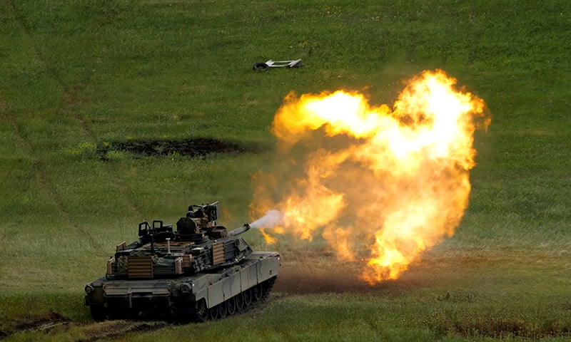 In this file photo, a US M1A2 "Abrams" tank fires during US- led joint military exercise "Noble Partner 2016" in Vaziani, Georgia, May 24, 2016. — Reuters